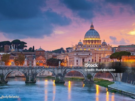View of St. Peter's cathedral in Rome, Italy during beautiful sunset.